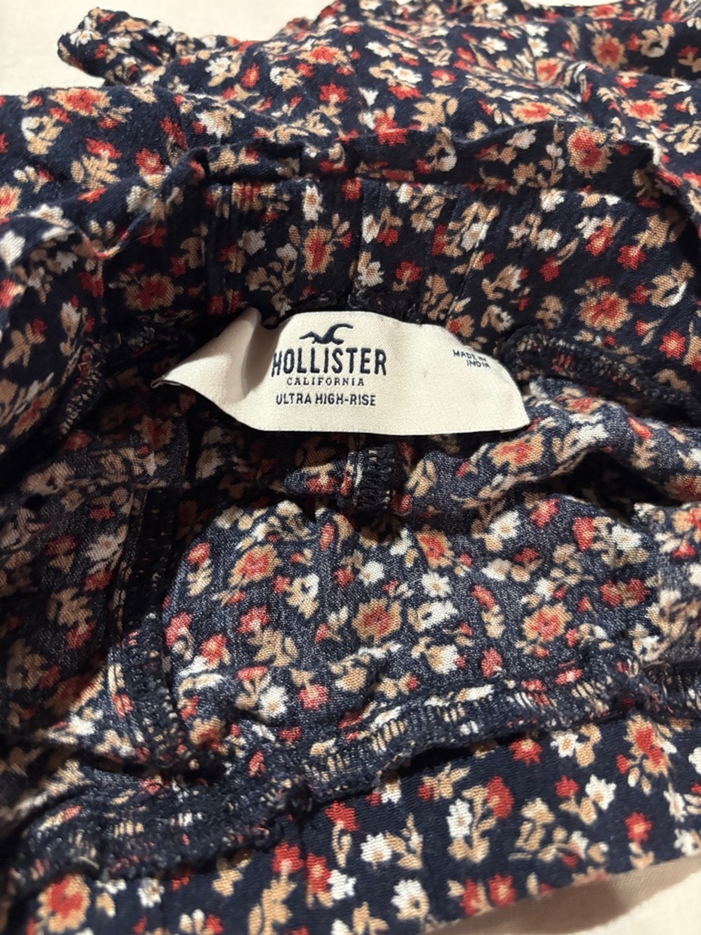 Hollister Navy Floral High-Rise Shorts with Red & Cream Blooms